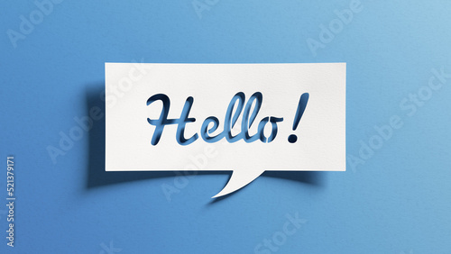 Hello salutation or greeting word to welcome someone or initiate a conversation. Design with letters cut out in paper speech bubble over blue background. Communication concept, introduction. photo