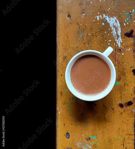 cup of coffee on the wooden table