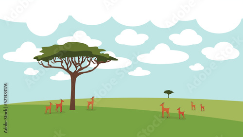 Antelopes near a tree in the African savannah