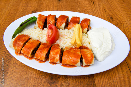 Delicious turkish kebab tantuni .Mersin et tavuk ekmek arasi tantuni,  yogurtlu tantuni durum. photo