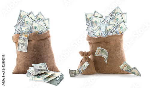 Burlap bags and flying dollar banknotes on white background