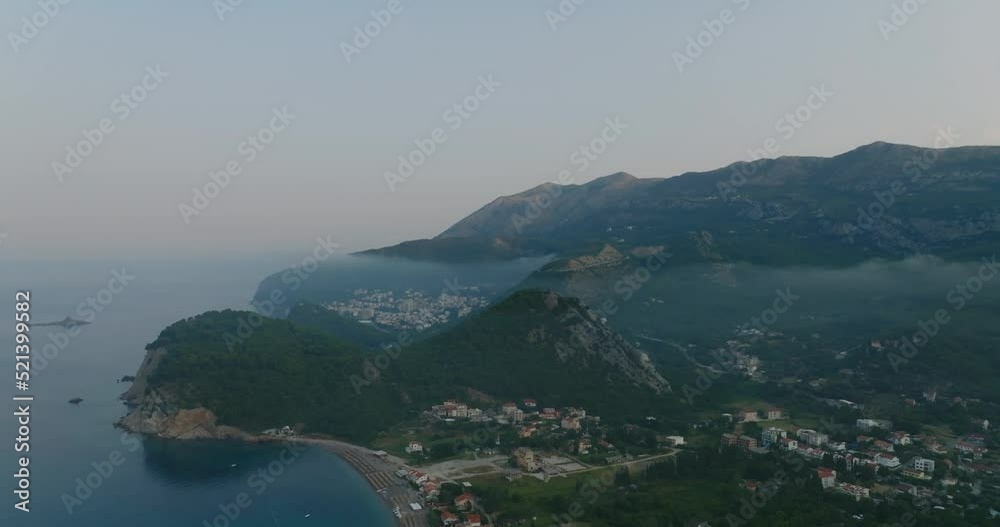 aerial view on Petrovac, Budva with clouds on sunrise aerial view on Petrovac, Budva with clouds on sunrise