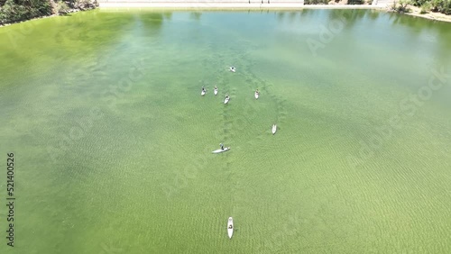 Aerial top view of the boats in the Goldwater lake on a sunny day photo