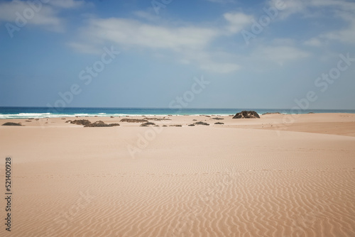 the endless beach of Corralejo in Fuerteventura. To reach the sea you have to come across dunes even 50 meters high