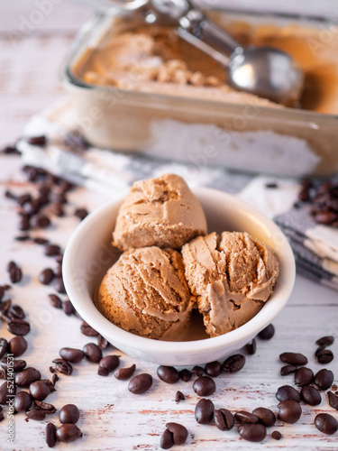 Coffee ice cream on rustic white table