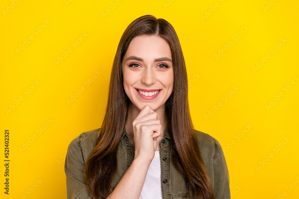 Close-up photo of charming adorable good mood woman touch chin brainstorming isolated on yellow color background Close-up photo of charming adorable good mood woman touch chin brainstorming isolated on yellow color background