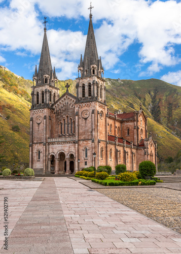 Front view of this great monumental temple built from 1877 to 1901, with a neo-Romanesque style and is made of pinkish marble stone extracted from the mountains of Covadonga