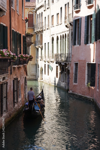 Gondolers in Venice Canals Italy Beautiful old architecture reflections high resolution 