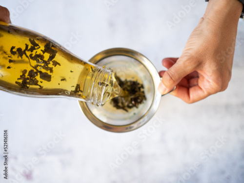 Watching from above as a green tea filters down