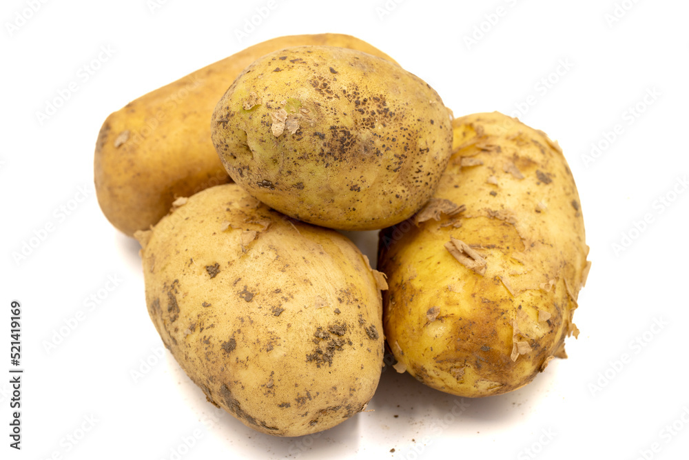 Ripe Potatoes. Fresh and raw potatoes isolated on white background. Organic food. close up Ripe Potatoes. Fresh and raw potatoes isolated on white background. Organic food. close up