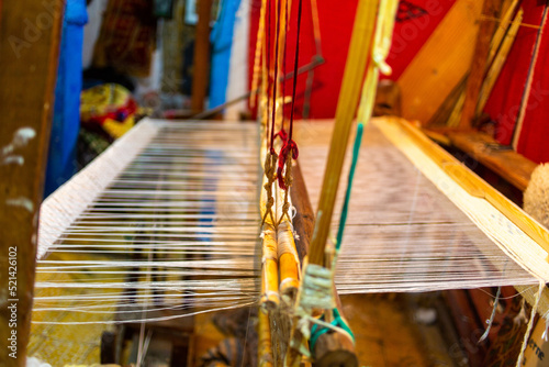 Chefchaouen, Morocco - 18 January 2022 : Traditional Moroccan Berber loom in a coton shop