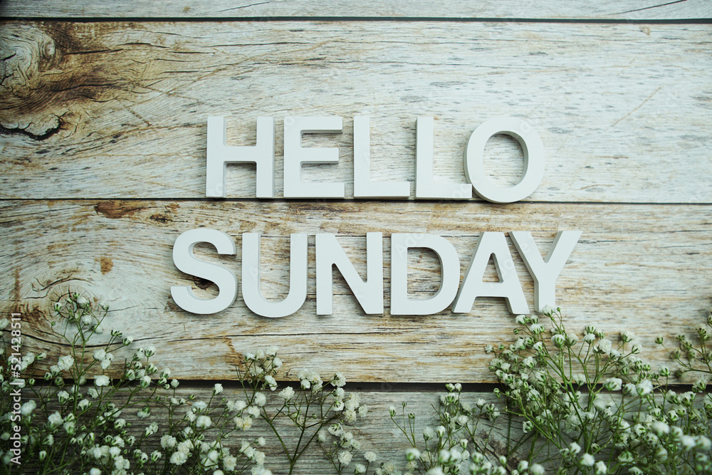 Hello Sunday alphabet letters on wooden background Hello Sunday alphabet letters on wooden background