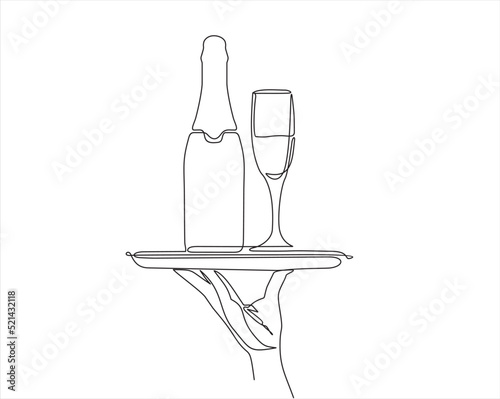 Continuous line vector illustration of hand holding dish with bottle and a glass drawn from the hand a picture of the silhouette. Line art. a bottle of champagne with a wine glass