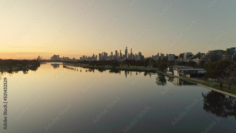 Albert Park Lake at Sunset with Melbourne City Skyline in the Background Albert Park Lake at Sunset with Melbourne City Skyline in the Background