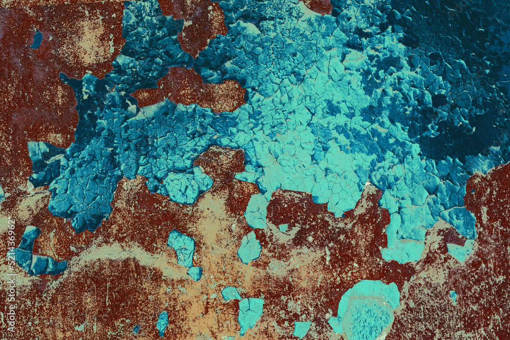 Bright blue and brown color of peeling cracked paint on an old wall. For texture or background pattern. Soft selective focus Bright blue and brown color of peeling cracked paint on an old wall. For texture or background pattern. Soft selective focus