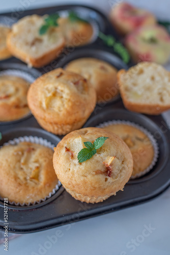 sweet home made vanilla peach muffins on a table