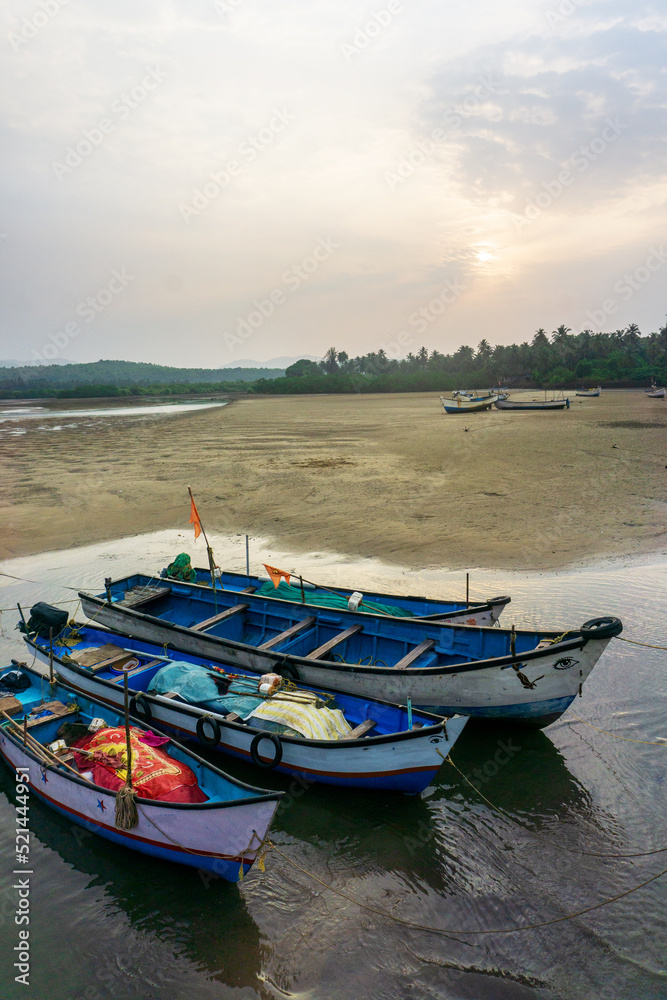 Local fishing boats on Talpona beach, south Goa, India.