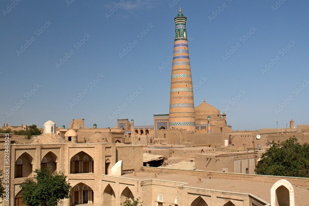 Khiva (Xiva) city was founded in the 6th century. View of the historic center of Itchan Kala The tallest building is the Islam Khoja minaret, 56 meters high. Uzbekistan.