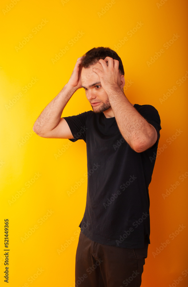 disappointment, the guy who lost the pressure on life. motsia on a yellow background disappointment, the guy who lost the pressure on life. motsia on a yellow background