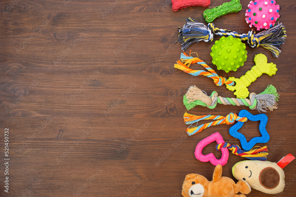 dog's toys on wooden table