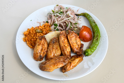 Chicken wings barbeque in a dish with BBQ grill sauce . Izgara tavuk kelebek sis kanat. Tavuk sis, gogus.