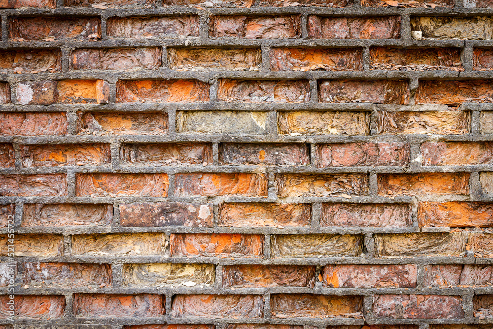 Yellow and red brick wall