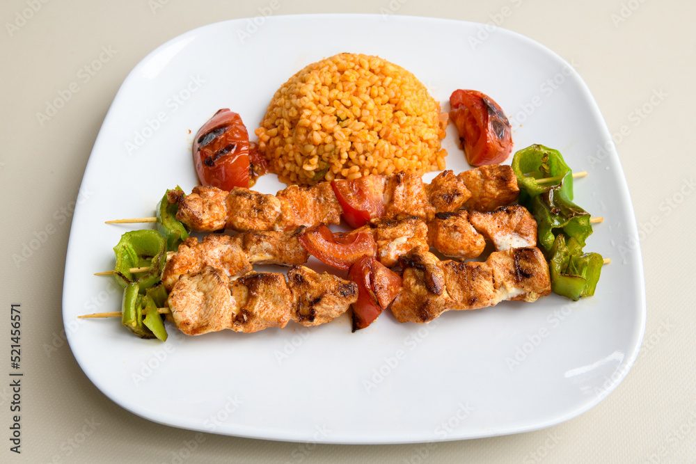 Chicken wings barbeque in a dish with BBQ grill sauce . Izgara tavuk kelebek sis kanat. Tavuk sis, gogus.