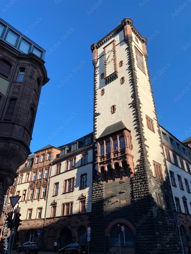 Travel in Frankfurt. Streets of Frankfurt with landmarks as Cathedral or Romerberg next to Main River. 