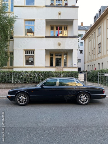 Luxury British vehicle Jaguar Sovereign in the city street.