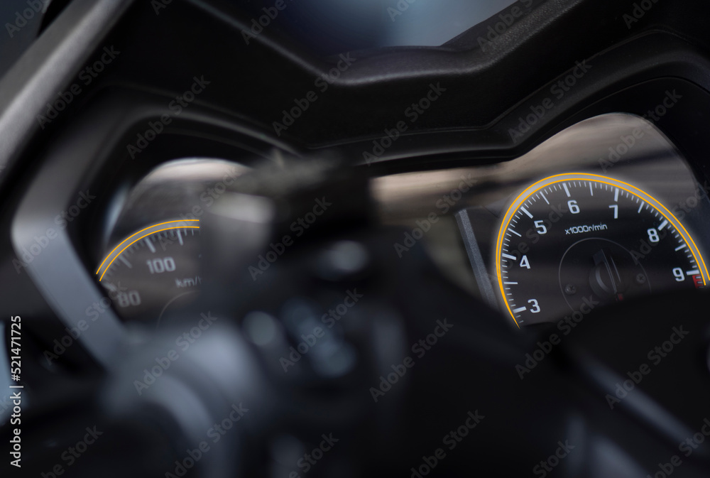 close up of speedometer in motorcycle bigbike. dashboard detail with indication lampe. in garage.