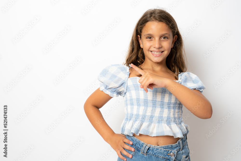 Brunette hispanic girl showing and pointing up with finger number one while smiling confident and happy. Brunette hispanic girl showing and pointing up with finger number one while smiling confident and happy.