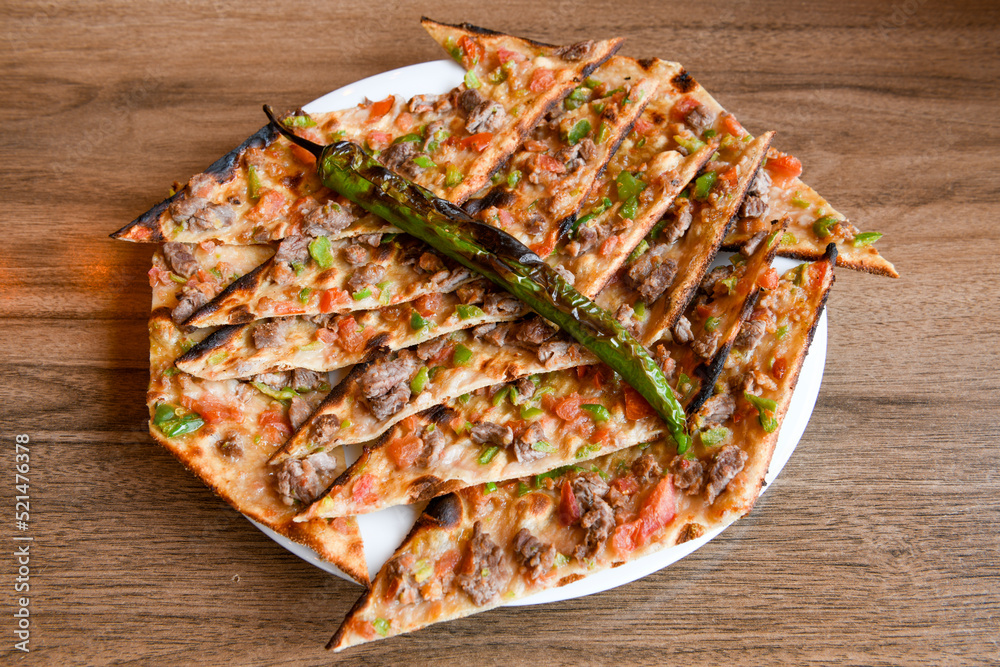 Turkish pita with minced cubed meat and cheese (Turkish name Kiyma