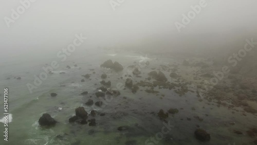 aerial view of rocky california coast on a foggy morning  photo