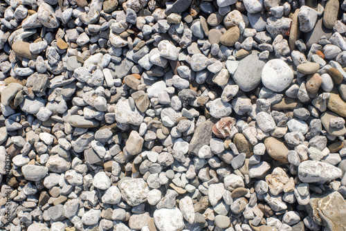 Round sea pebbles, background texture.