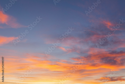 Amazing sunset with pink clouds and blue sky © mreco