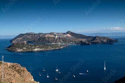 View from observatory viewpoint onto the volcanic island of Vulcano and boats on the sea © magnifynature