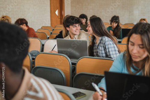 Cheerful teen couple during lesson