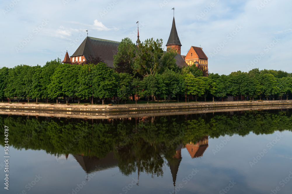 View of the Koningberg Cathedral on Immanuel Kant Island and the Pregolya River on a sunny summer day, Kaliningrad, Russia