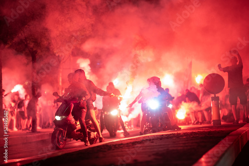 Red Star Football fans with torches and flags marching on streets and celebrating league title win in Belgrade, Serbia 22.05.2022 © Dragan