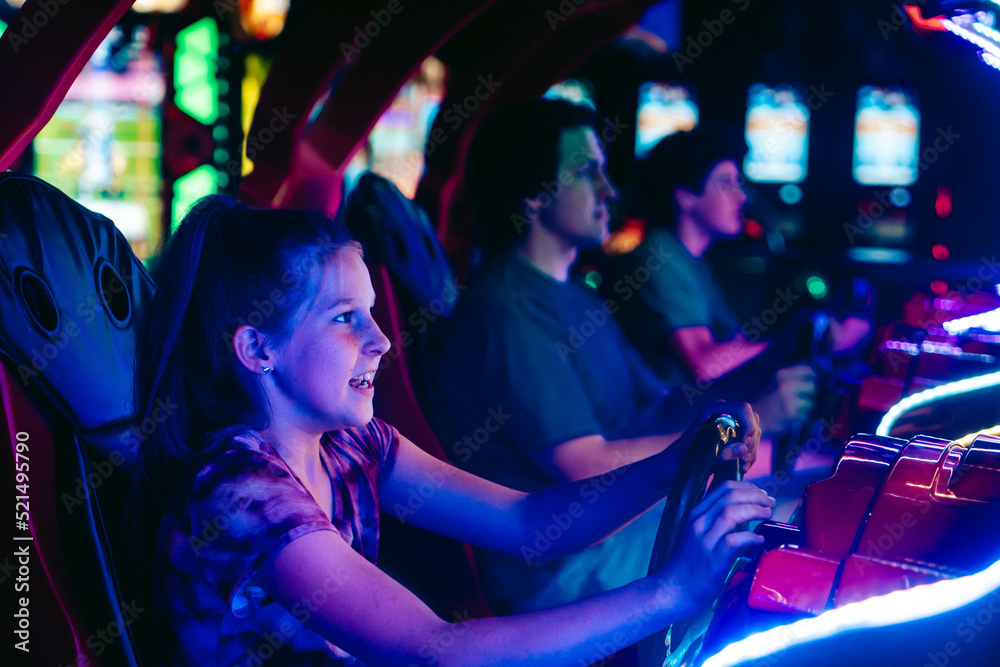 Playing in an arcade with neon lights - obrazy, fototapety, plakaty 