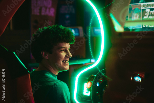 Photography Playing in an arcade with neon lights