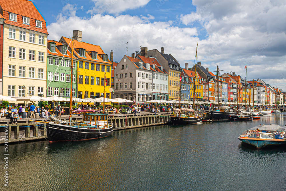 Copenhagen, Denmark - Old town, Nyhavn - picturesque summer view of colorful buildings of the new harbour