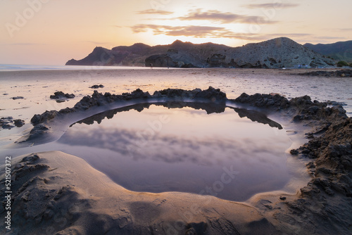 Obraz na płótnie Sunset serenity at Playa de Mónsul, Andalusia w salonie