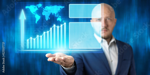 Businessman holding virtual screen with graphs of growth global business and empty space for your text, copy-space