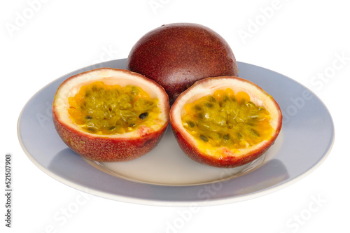 Сut passiflora fruit isolated on white background