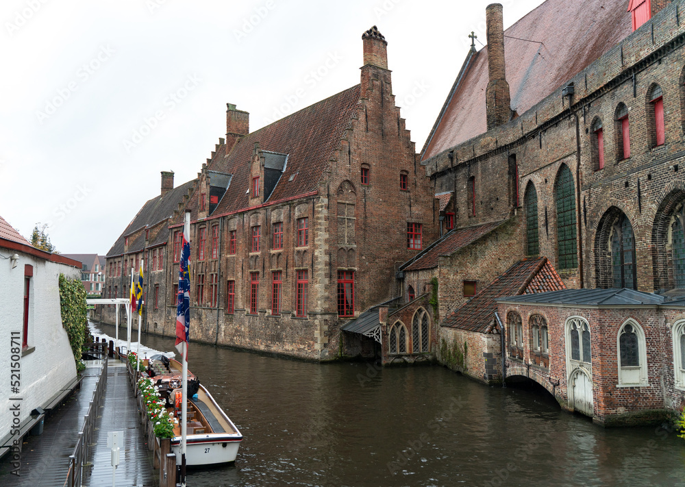 Tipical canal in Belgium with ancient houses. View of Brugges
