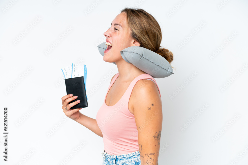 Woman with Inflatable Travel Pillow over isolated background laughing in lateral position Woman with Inflatable Travel Pillow over isolated background laughing in lateral position