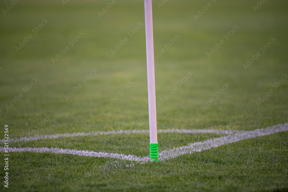 Flag corner in football field. Place for a corner kick on a soccer ball