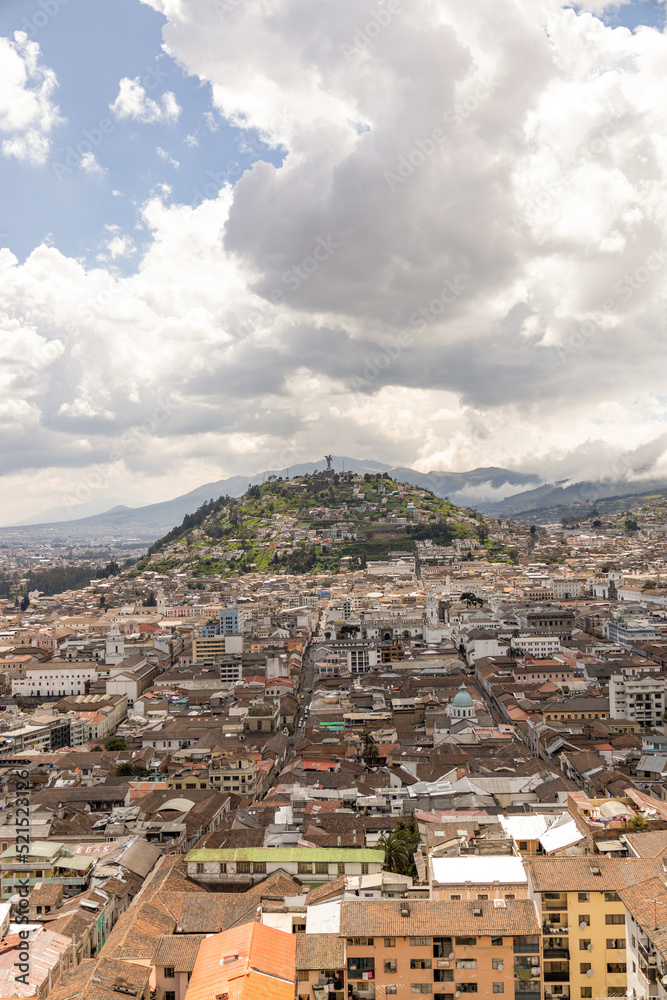 beautiful landscape of the city of Quito-Ecuador in Latin America, architecture with mountain in the background and sky with clouds, panoramic scene