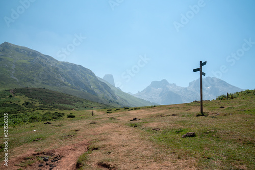 mountain path on a beautiful background with a sign